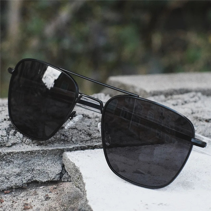 Occhiali da sole con lenti in vetro